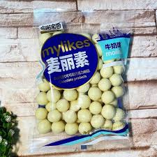 Palline di cereali ricoperte di cioccolato bianco